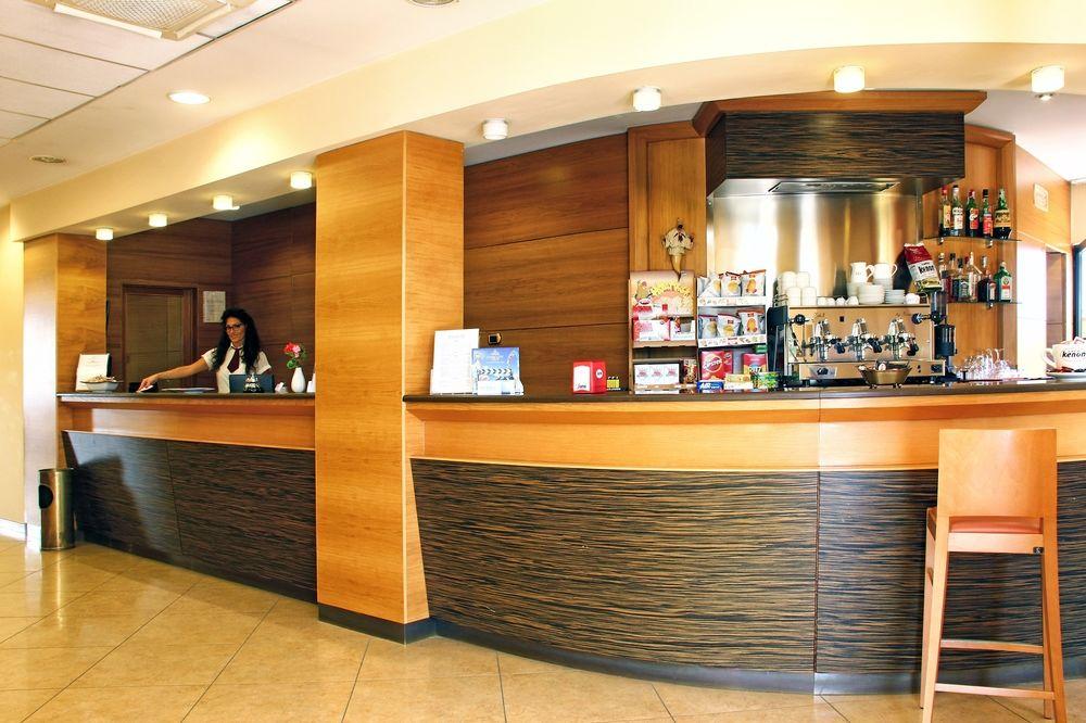 City Hotel Casoria Bagian luar foto