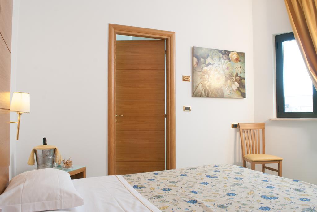 City Hotel Casoria Bagian luar foto
