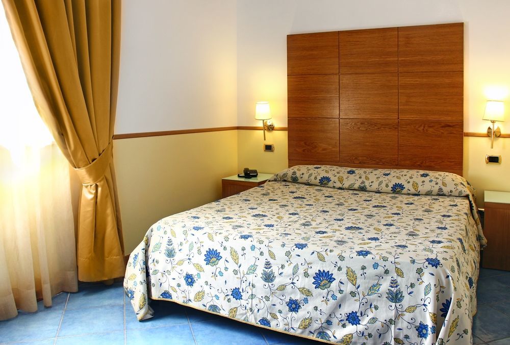 City Hotel Casoria Bagian luar foto