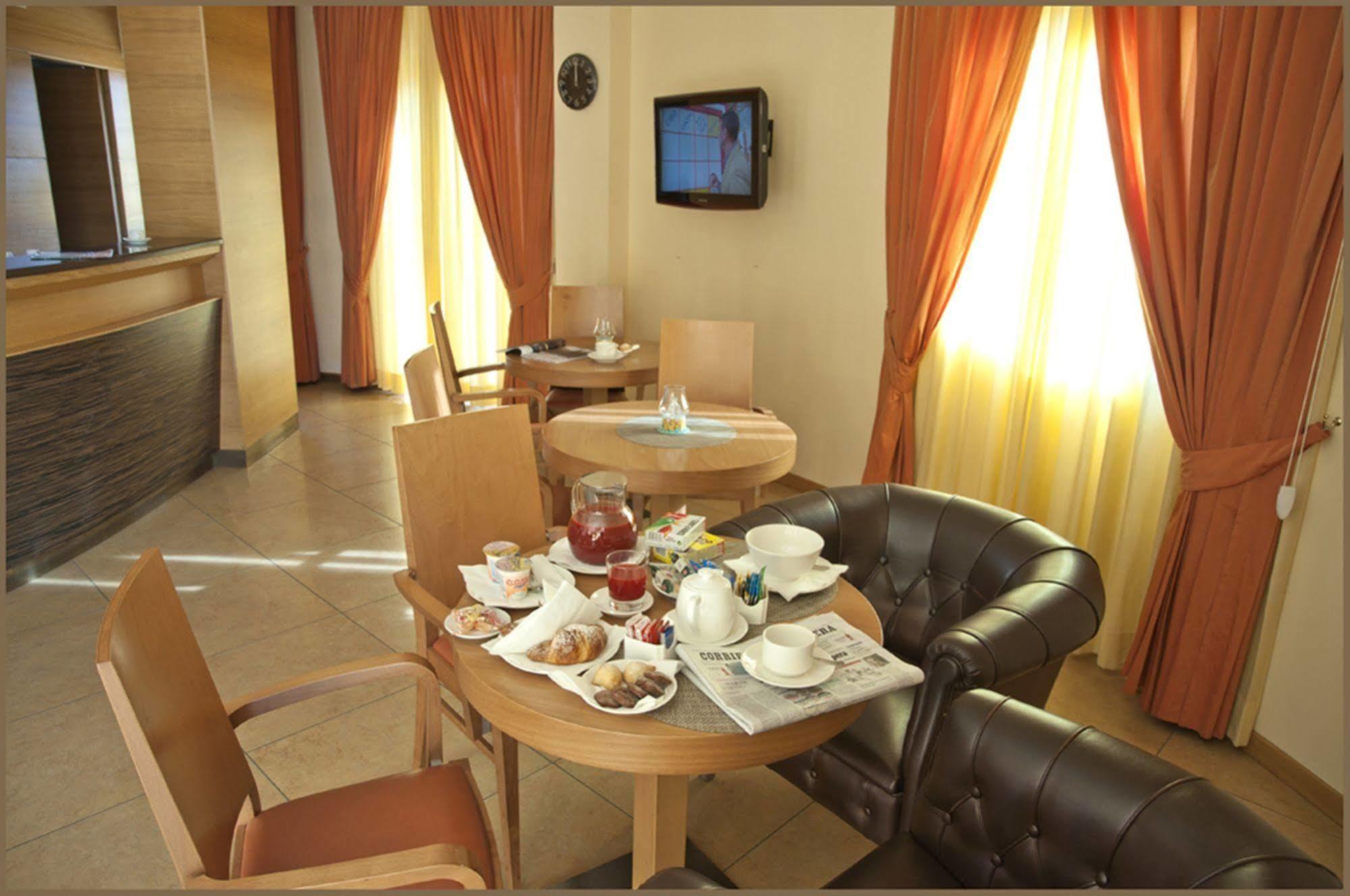 City Hotel Casoria Bagian luar foto